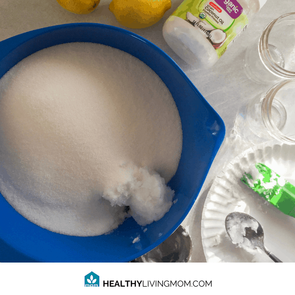 Lemon Sugar Scrub - Step 1 - Pour sugar and scoop coconut oil into a mixing bowl.